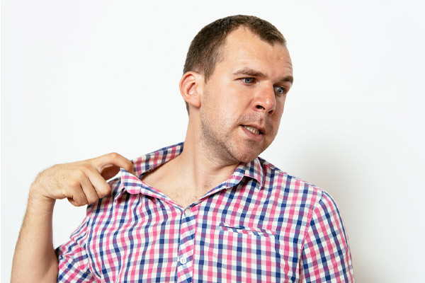 A man in a checkered shirt