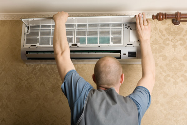 technician checking the AC