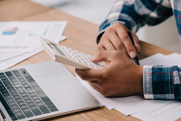 a man using his calculator