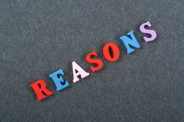 reasons spelled using colored wooden letters depicting common causes why generator won't start