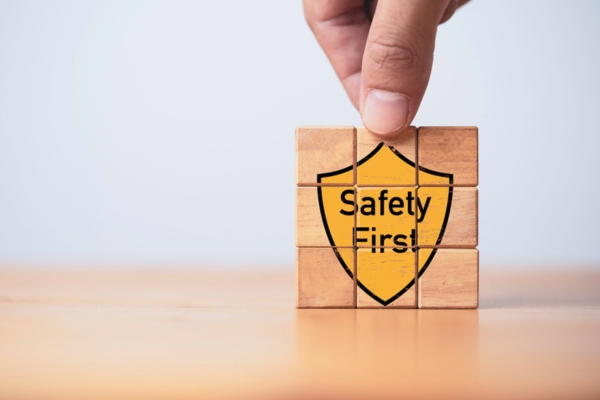 safety first icon on wooden puzzle depicting propane delivery protocols