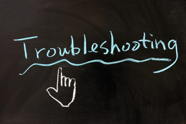 chalk drawing of troubleshooting word and hand depicting generator troubleshooting