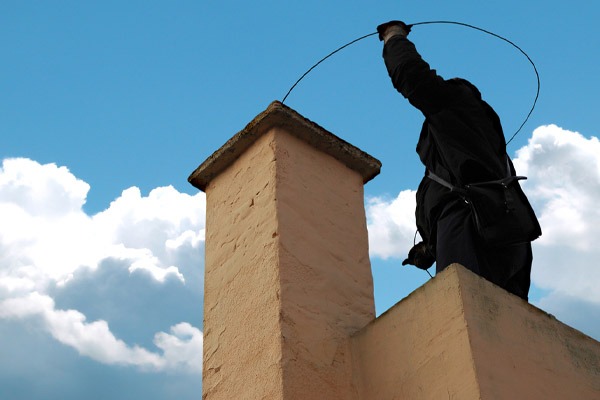 image of a chimney sweep depicting heating safety