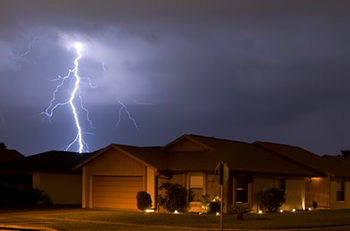 power outage - lightning behind a single story house