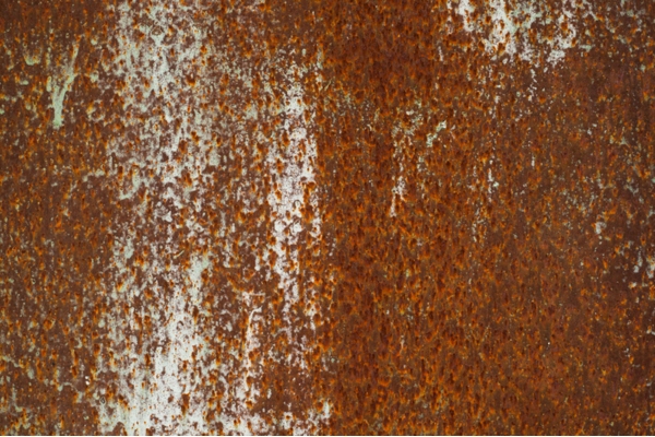 rust depicting factors leading to sludge formation in a heating oil tank