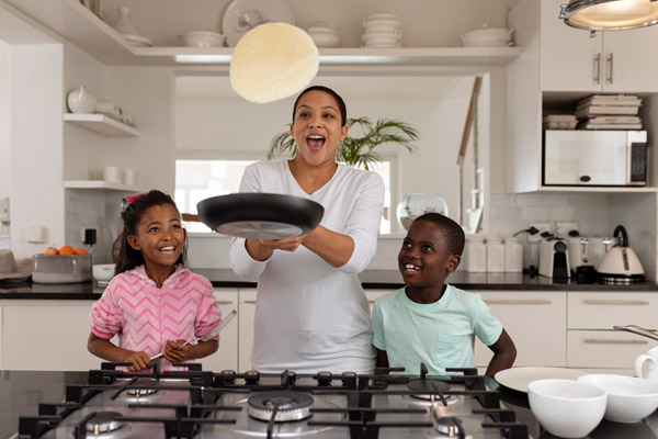 family cooking with propane gas stove depicting propane efficiency