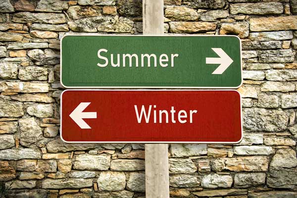 summer vs winter signs depicting when to convert from heating oil to propane