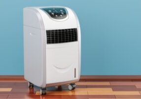 portable air conditioner utilizing significant floor space