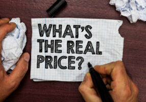 whats the real price written on paper depicting oil to propane conversion costs